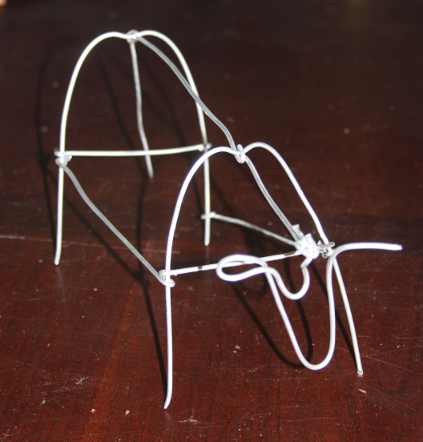 Wire armature for paper mache cow children craft. 