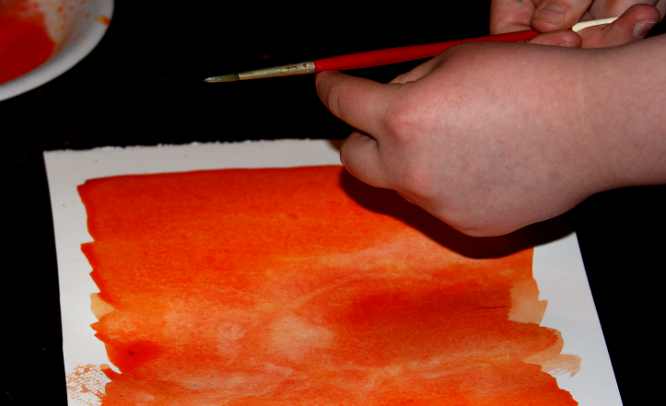 Splatter water over watercolor paint background art lesson children.