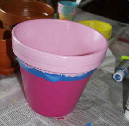 Paint top of pot with acrylic paint